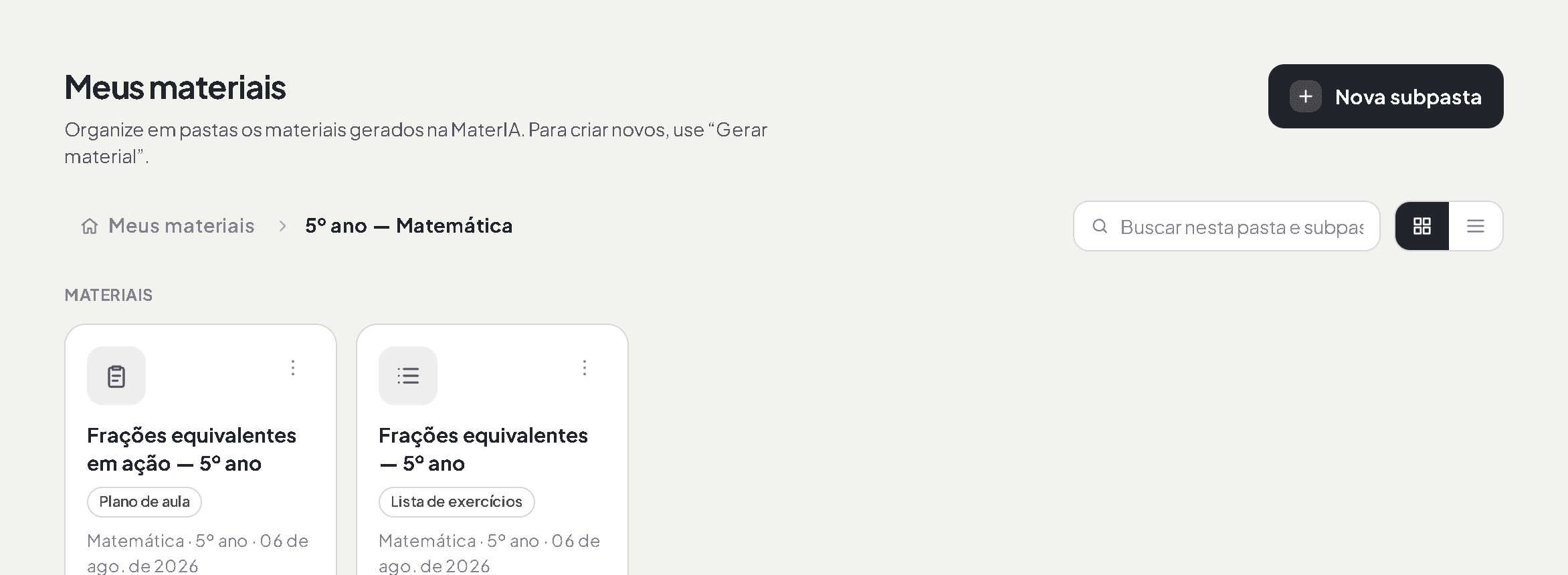 Biblioteca do MaterIA: materiais salvos organizados em pastas, com as ações de abrir, renomear, mover e baixar